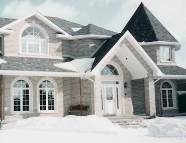 Photos of windows on a house in the winter